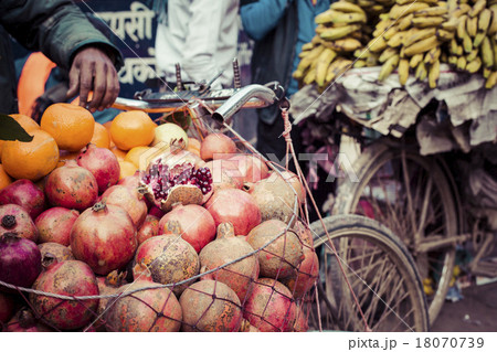 The hawker sell his fruits in Thamel in Katmandu 18070739