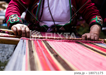 Traditional hand weaving in the Andes Mountains Traditional hand weaving in the Andes Mountains 18071175