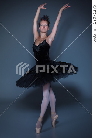 Portrait of the ballerina in ballet tatu on blue 18071275