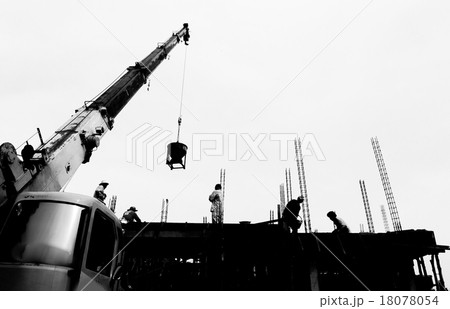 silhouette labor working in construction site 18078054