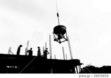 silhouette labor working in construction site 18078059