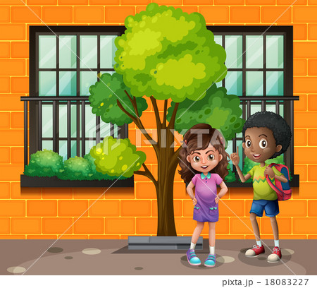 Boy and girl standing on the street Boy and girl standing on the street 18083227