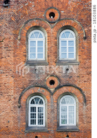 Old Brick Wall with White Windows 18103886