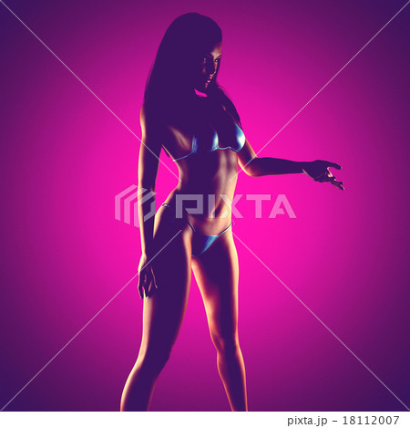 sexy bikiny woman at pink background 18112007