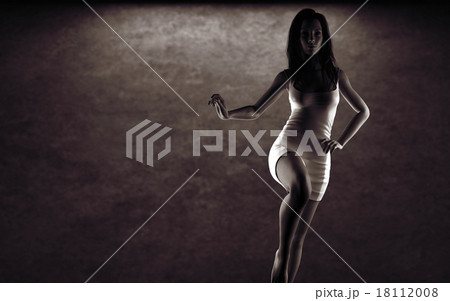 sexy woman in dress posing near stone wall 18112008
