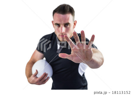 Tough rugby player looking at camera 18113152