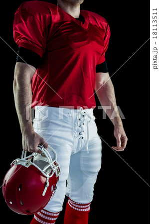American football player holding his helmet American football player holding his helmet 18113511