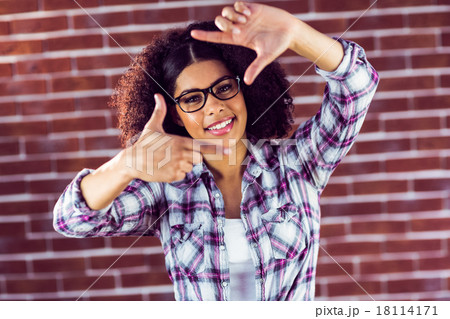 Attractive hipster taking picture with hands Attractive hipster taking picture with hands 18114171