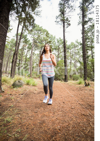 Young happy jogger walking Young happy jogger walking 18114375