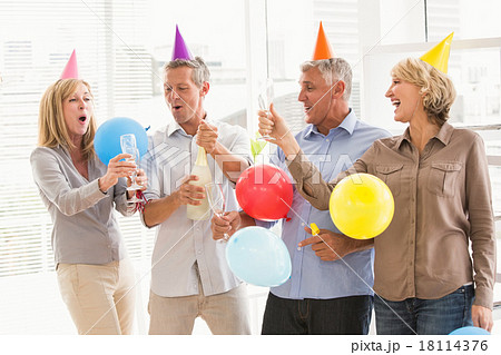 Casual business people toasting and celebrating birthday Casual business people toasting and celebrating birthday 18114376