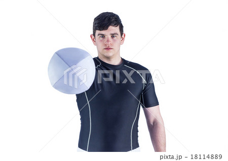 Rugby player handing a rugby ball Rugby player handing a rugby ball 18114889