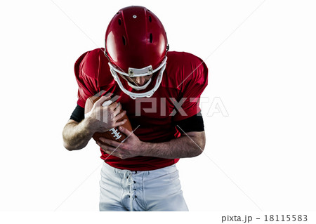 American football player protecting football 18115583