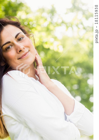 Beautiful brunette in the park 18115938
