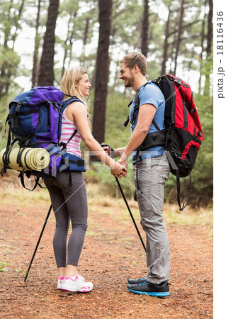 Young happy hiker couple looking at each other 18116436