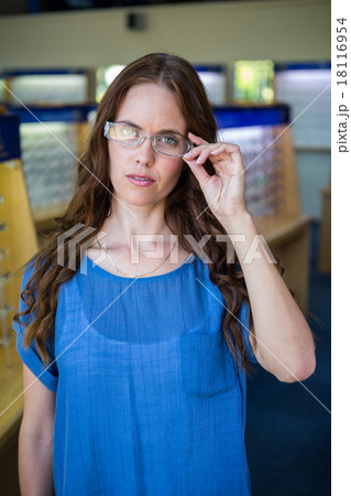Pretty woman shopping for new glasses 18116954