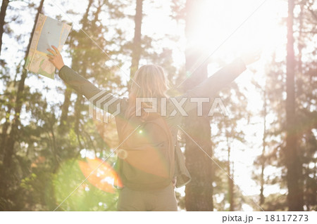 Carefree blonde hiker with arms outstretched 18117273