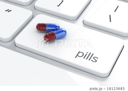 Pills on the computer laptop keyboard 18123683
