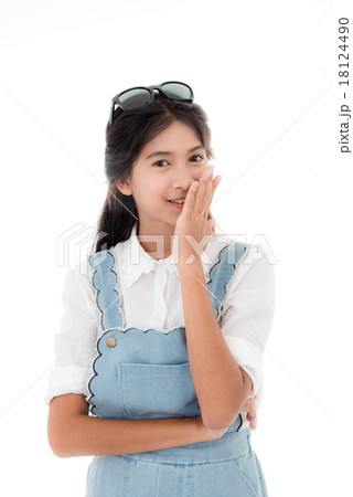 Asian teenage girl smiling 18124490