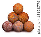 Ten rusty iron cannon balls on white background 18128779