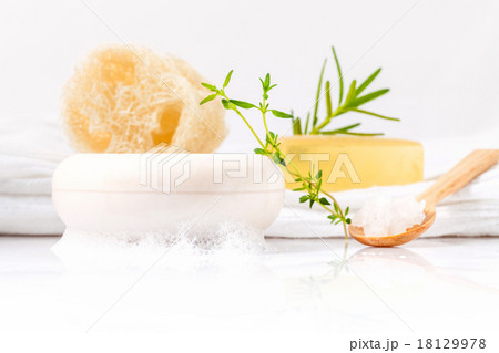 Herbal spa soap bar on white bath towel . Herbal spa soap bar on white bath towel . 18129978