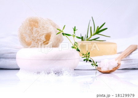 Herbal spa soap bar on white bath towel . 18129979