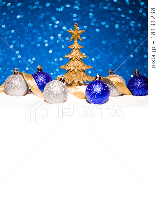 christmas ornament in snow on glitter background 18131238