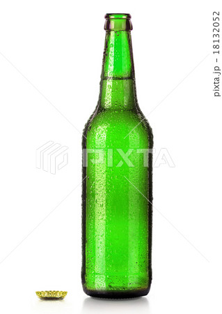 Bottle of beer with drops isolated on white 18132052