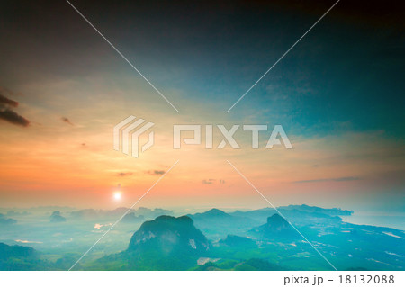 mountains under colorful sky in sunset mountains under colorful sky in sunset 18132088