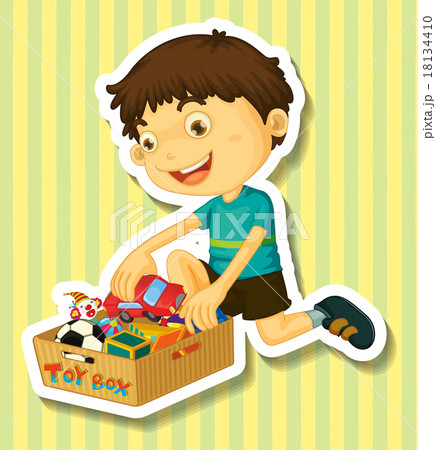 Boy putting toys in the box Boy putting toys in the box 18134410