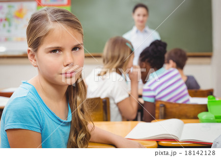 Pupil frowning at camera during class Pupil frowning at camera during class 18142128