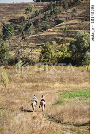 Young couple in love riding Young couple in love riding 18143698