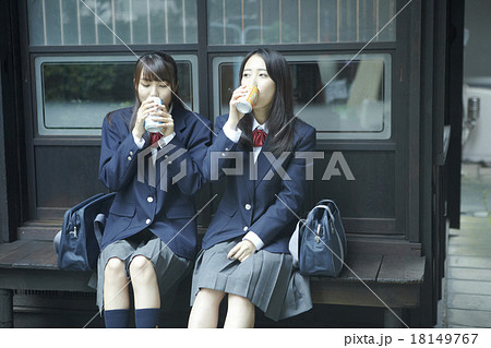 School Girls At Home Stock Photo