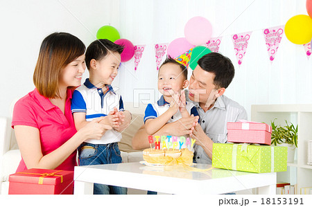 Asian family celebrating birthday Asian family celebrating birthday 18153191