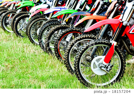 Motocross riders lined up before start on the race 18157204