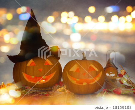 close up of carved halloween pumpkins on table 18159102