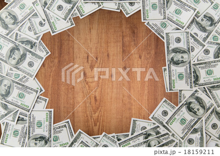 close up of dollar money on wooden table 18159211