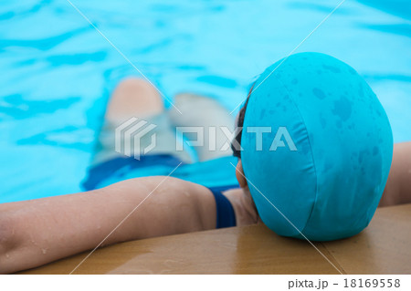 Woman relaxing on the swimming pool Woman relaxing on the swimming pool 18169558