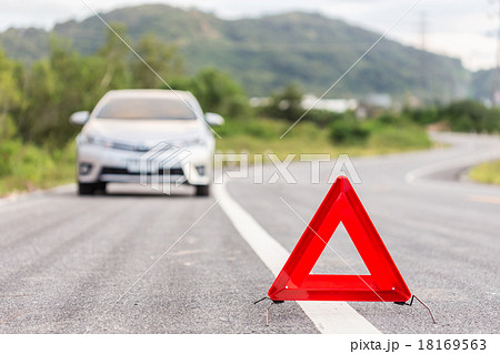 Red emergency stop sign and broken silver car Red emergency stop sign and broken silver car 18169563