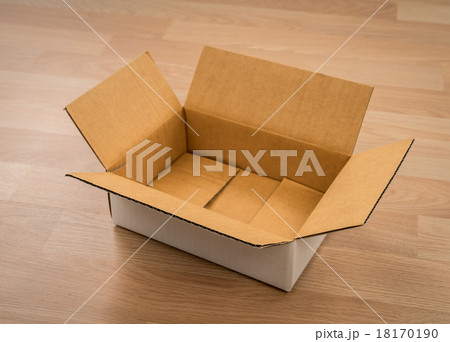 Cardboard box on wood 18170190