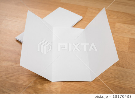 Trifold white template paper on wood texture 18170433