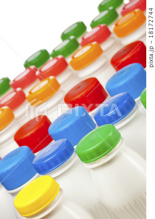 dairy products bottles with bright covers 18172744
