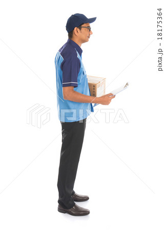 indian delivery man in blue uniform indian delivery man in blue uniform 18175364