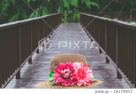 selective focus hat on the wooden bridge in filter 18179952