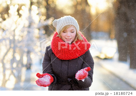 Young woman having fun in winter Young woman having fun in winter 18180724