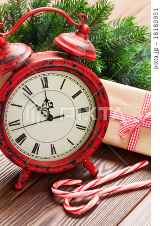 Christmas alarm clock, gift box and fir tree 18180951