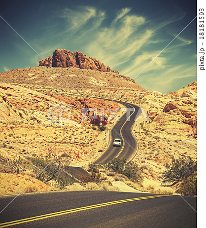 Retro toned curved desert highway. Retro toned curved desert highway. 18181593