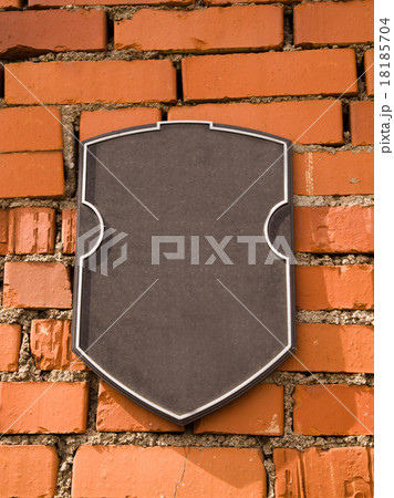 a plaque on the stone wall a plaque on the stone wall 18185704