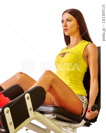 Girl workout on leg press. Girl workout on leg press. 18189515