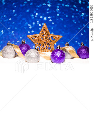 christmas ornament in snow on glitter background christmas ornament in snow on glitter background 18190906