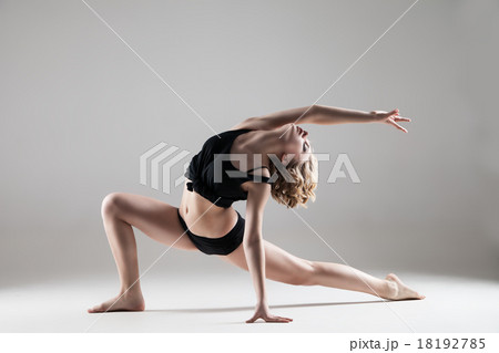 young beautiful woman in black T-shirt and shorts 18192785